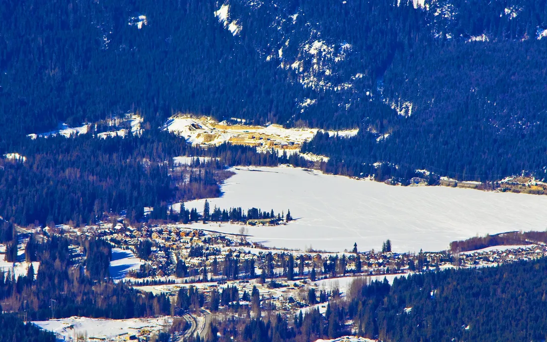 Snow-covered Whistler valley and village seen from the Roundhouse Lodge gondola terminal